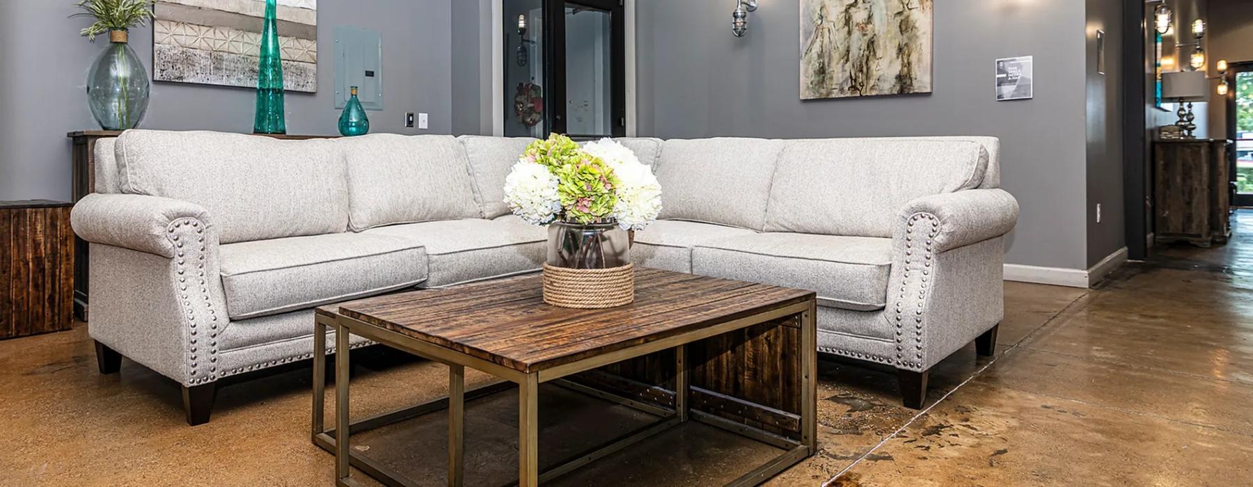 a living room with a couch and coffee table